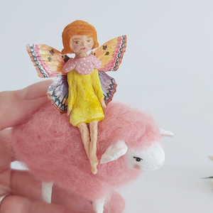 A close up photo of the vintage style, spun cotton fairy, against a white background. Pic 3 of 7. 