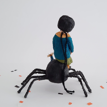 Load image into Gallery viewer, The back view of a vintage style, spun cotton girl sitting on the back of a spun cotton spider. Pic 9 of 10. 
