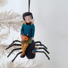 Load image into Gallery viewer, A vintage style, spun cotton girl sitting on a spider ornament, dangling from a tree. Pic 1 of 10. 
