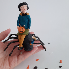 Load image into Gallery viewer, A vintage style, spun cotton spider girl ornament sitting in a hand against a white background. Pic 2 of 10. 
