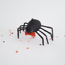 Load image into Gallery viewer, A vintage style, spun cotton spider standing on Halloween confetti against a white background. Pic 1 of 8. 
