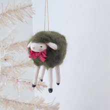 Load image into Gallery viewer, A vintage style, woolly spun cotton green sheep ornament hanging on a white tree. Pic 3 of 7. 
