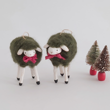 Cargar imagen en el visor de la galería, Two vintage style, woolly spun cotton green sheep ornaments standing next to two small vintage bottle brush trees. Pic 1 of 7. 
