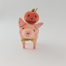 Load image into Gallery viewer, Front view of spun cotton pig sculpture and jack o lantern. Photo 6
