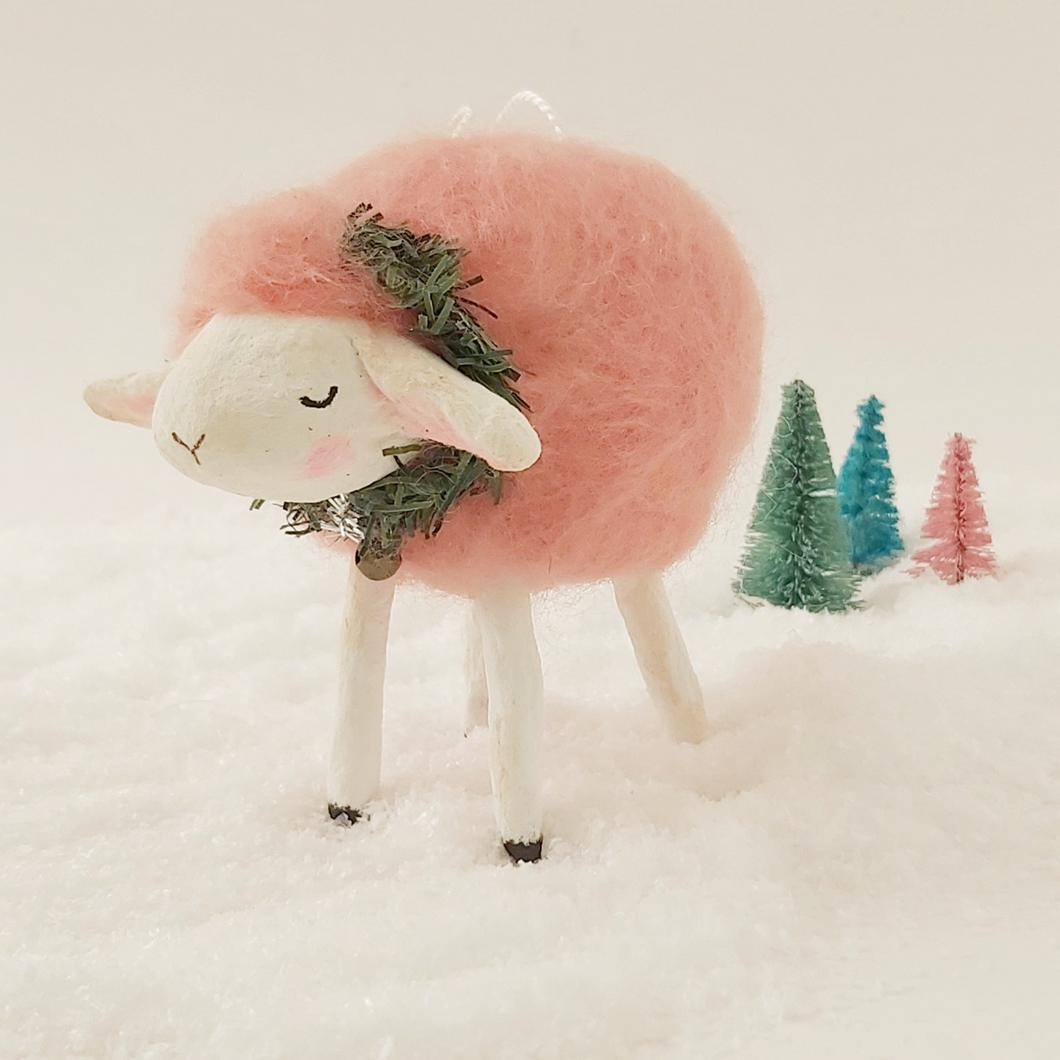 needle felted pink sheep ornament, with garland and a jingle bell around her neck. picture 1 of 7