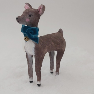 Side view of spun cotton deer. Photo 4 of 8. 