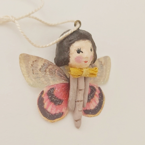 Close up side view of butterfly girl. Pic 4 of 8.
