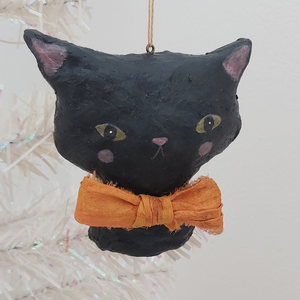 Spun cotton black cat ornament, hanging from tree. Pic 1 of 6.