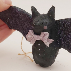 Close up of spun cotton bat's face and glittery wings. Pic 3 of 6.