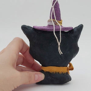 Back view of spun cotton witch cat ornament. Pic 7 of 7. 