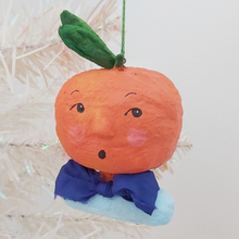 Cargar imagen en el visor de la galería, Spun cotton orange boy ornament hanging from tree. Pic 1 of 6.
