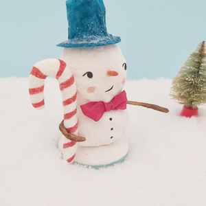 Closer view of spun cotton candy cane and snowman face. Pic 3 of 8. 