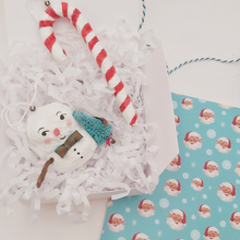 Cargar imagen en el visor de la galería, Spun cotton snowman and candy cane ornaments, laying in white gift box with white tissue shredding. Pic 6 of 7.
