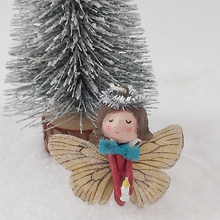 Cargar imagen en el visor de la galería, Spun cotton Christmas butterfly angel, standing next to mini Christmas tree. Pic 4 of 6.
