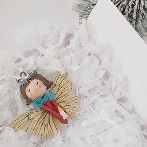 Spun cotton Christmas butterfly angel ornament, laying in white gift box. Pic 6 of 6