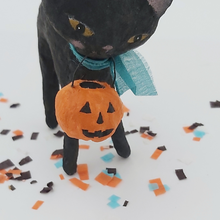 Load image into Gallery viewer, Close view of spun cotton jack-o-lantern held by spun cotton black cat. Pic 5 of 6. 
