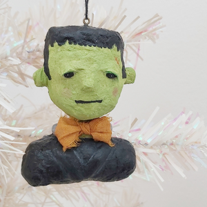 Spun cotton Frankenstein ornament hanging on tree. Pic 3 of 9.
