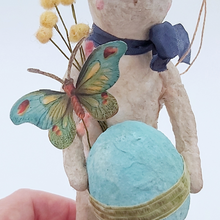 Load image into Gallery viewer, Close up of a paper butterfly held by vintage style, spun cotton Easter bunny. Pic 5 of 9.
