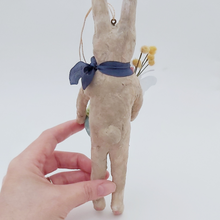 Load image into Gallery viewer, Back view of a vintage style, spun cotton Easter bunny, held in hand against a white background. Pic 7 of 9.
