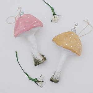 Pink and yellow spun cotton mushrooms on a white background. Pic 4 of 4. 