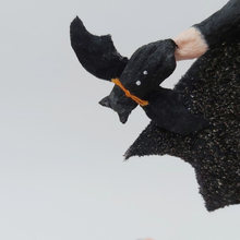Cargar imagen en el visor de la galería, Close up of tiny spun cotton bat being held in bat girl&#39;s hand. Pic 4 of 9.
