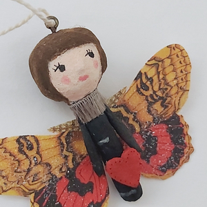Close up of spun cotton Valentine's Day butterfly girl. Pic 3 of 4. 