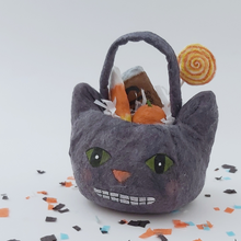 Load image into Gallery viewer, Spun cotton cat Halloween bucket filled with spun cotton candy, sitting on a white background with Halloween confetti. Pic 1 of 5.
