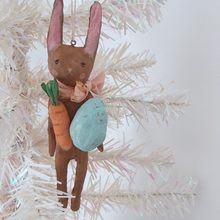 Cargar imagen en el visor de la galería, Spun cotton chocolate brown Easter bunny ornament hanging on white tree. Pic 1 of 8.
