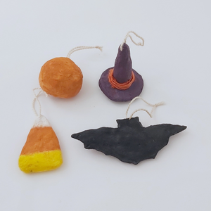 Back view of spun cotton jack-o-lantern, witch hat, candy corn, and bat ornaments. Pic 5 of 6.