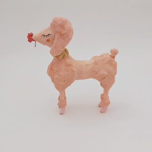 Side view of spun cotton pink poodle sculpture. Pic 4 of 7.