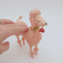 Load image into Gallery viewer, Spun cotton pink poodle sculpture next to hand, for size comparison. Pic 2 of 7. 
