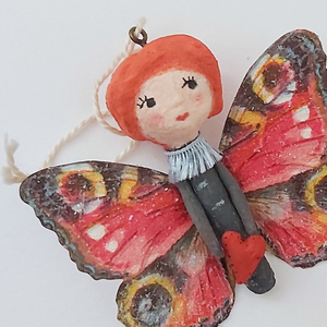 Close up of spun cotton Valentine's Day butterfly girl. Pic 4 of 4. 