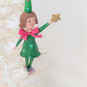 Spun cotton Christmas tree girl ornament, hanging from white Christmas tree. Pic 2 of 8.