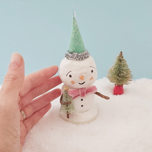 Load image into Gallery viewer, Hand next to spun cotton vintage style snowman, for size comparison. Picture 2 of 6.
