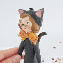 Load image into Gallery viewer, A close-up of the face of a vintage style spun cotton black cat girl ornament. Pic 3 of 8. 
