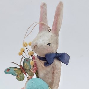 Close up of vintage style, spun cotton Easter bunny's face against a white background. Pic 1 of 9. 