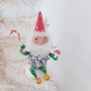 Vintage style spun cotton pine cone elf ornament, hanging on white Christmas tree. Pic 4 of 9.