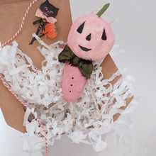 Cargar imagen en el visor de la galería, Spun cotton pink jack-o-lantern sitting in white gift box on white tissue shredding on white background. Pic 6 of 10.
