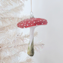 Load image into Gallery viewer, A vintage style spun cotton red mushroom ornament, hanging on a white tree. Pic 2 of 5. 
