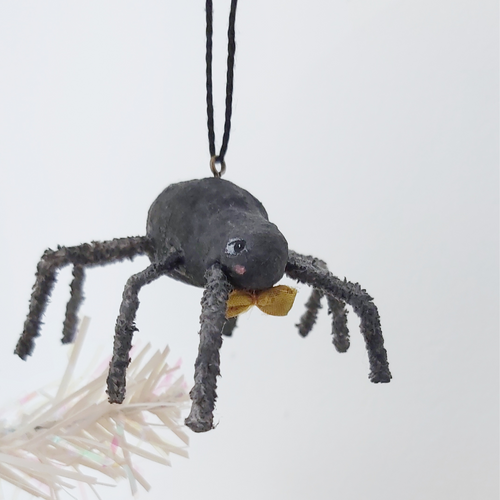 Vintage style spun cotton spider ornament  hanging from a tree against a white background. Pic 1 of 6. 