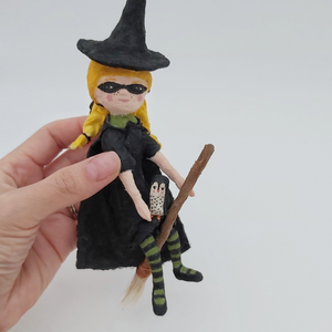 Vintage style spun cotton witch ornament, held in hand for size comparison. Pic 3 of 10. 