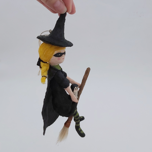 Side view of vintage style spun cotton witch ornament. Pic 8 of 10. 