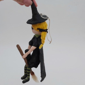 Opposite side view of vintage style spun cotton witch ornament. Pic 9 of 10.